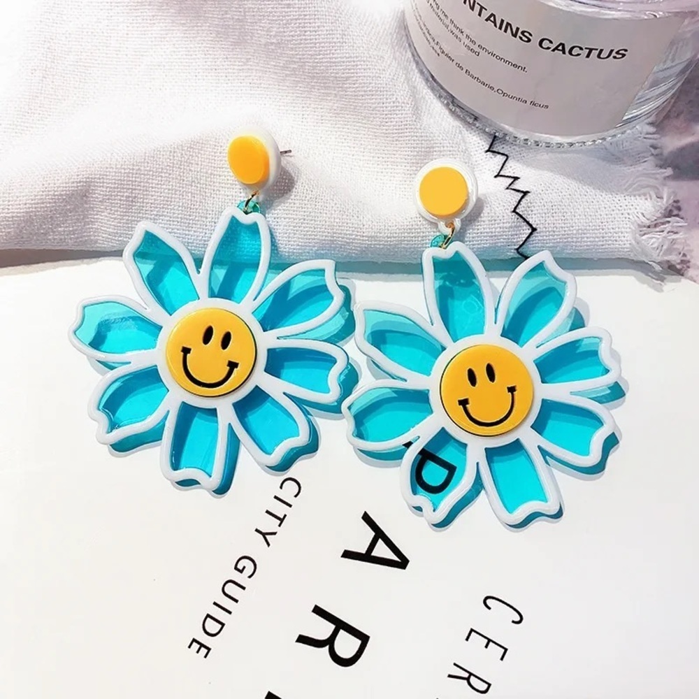 Clear smiley face acrylic flower earrings